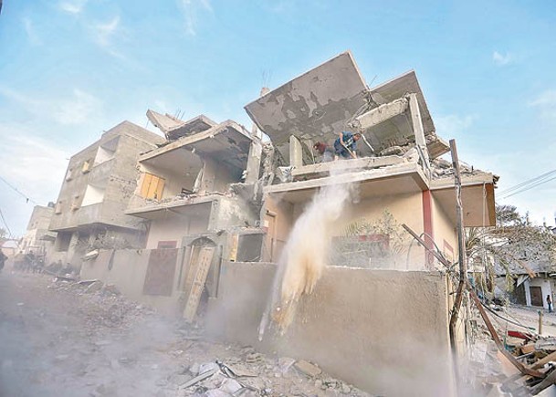 拉法住宅遭遇空襲。（Getty Images圖片）