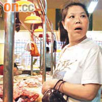 深圳一名家庭主婦直言擔心死豬流入市面，近期會減少吃豬肉。（黃少君攝）