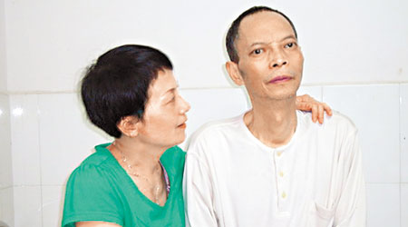 李旺陽（右）生前與妹妹李旺玲的合照。