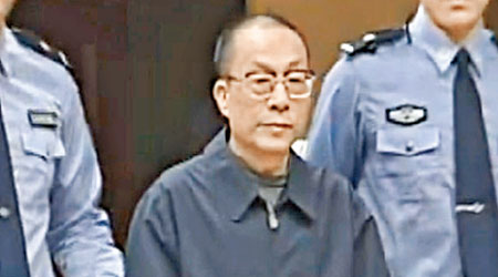 劉志軍昨日於庭上聽判決，仍面露微笑。（電視畫面)