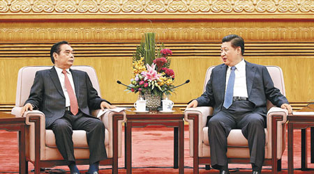 習近平與黎鴻英（左）昨在北京會面。（中新社圖片）