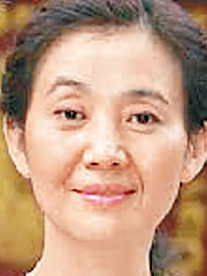 北大方正行政總裁李友被指助令計劃妻子谷麗萍（圖）逃捕。（互聯網圖片）