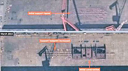 英媒公布衞星圖片指中國大連一船塢正建造疑似航母。（互聯網圖片）