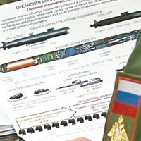 俄媒拍到印有核魚雷機密資料的文件。