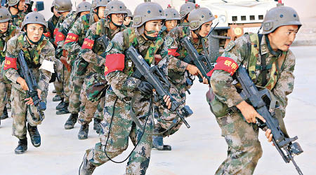 北京軍區將改名為中部戰區，右圖為北京軍區過往演練場景。