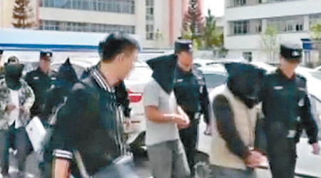 警方破獲跨國拐賣婦女案，抓獲多名疑犯。（電視畫面）