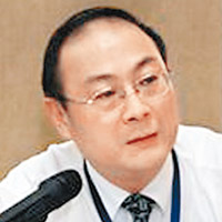 北京的人民大學國際關係學院副院長金燦榮