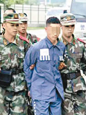 海南公布省內四宗偵破的間諜案，圖為被捕的涉嚴間諜。（資料圖片）