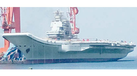 國產「001A」型航空母艦在大連打造，大連亦曾發生日本人偷拍解放軍軍事設施事件。（資料圖片）
