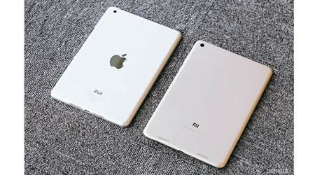 「Mi Pad」（右）被指與蘋果「iPad」（左）過於相似。（資料圖片）