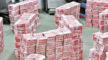 廣東警方近日搗破假幣工廠，檢獲大量假鈔。