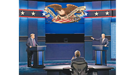 特朗普與拜登在辯論中唇槍舌劍。（美聯社圖片）