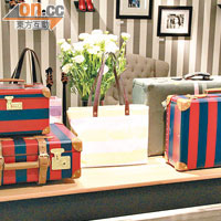 Manolo設計的化妝箱（上，$7,900）及行李箱（$15,900）。