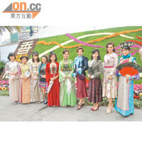 昨日十位美女以不同特色服裝上陣，在花卉攝影比賽中任拍。