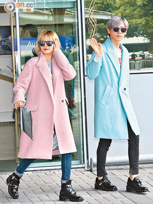泫雅與張賢勝分別穿粉紅、粉藍大褸步出機場，甚為搶鏡！