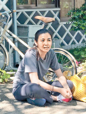 獨愛福岡的Yoyo，工作時愛以單車代步。
