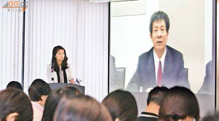 瑞金礦業董事局主席陸田俊（螢幕）表示，今後要提升公司管治。（黎達豪攝）