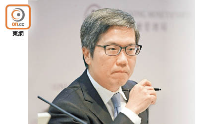 香港金管局向銀行釐清放寬按揭保險計劃的問題。圖為金管局副總裁阮國恒。