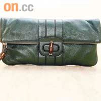 Metallic green clutch	$8,400