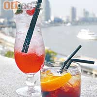 Mr Bund Martini及Mrs Bund Martini是店內招牌雞尾酒，而粉紅色的則是Singapore Sling（左）。