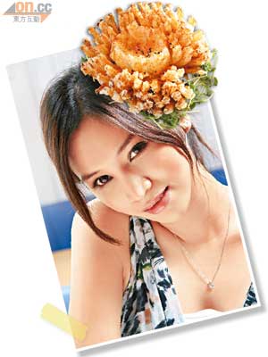 七味洋葱花 $18<BR>洋葱切開後炸至散開猶如向日葵的形狀，然後在表面撒上日本七味粉，香口惹味甚受年輕食客歡迎。