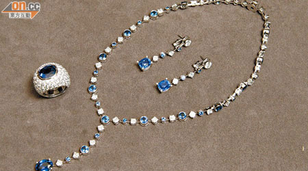 藍寶石系列<br>頸鏈 $1,566,000<br>耳環 $1,146,000<br>戒指 $1,691,000