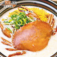 瑤柱蟹黃粥 $68<br>新鮮膏蟹配上用東北大米和泰國香米煲出來的粥底，每一啖都是鮮味。