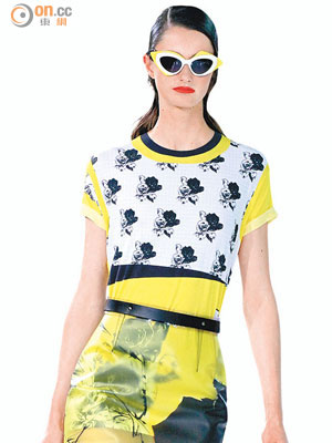 鮮黃色加上滿身的玫瑰印花，沒有一點「娘」味，反而因pencil skirt採用了PVC膠質衣料而洋溢着未來氛圍。