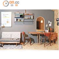 深灰色的牆身，配以淺木色的家具，令小小居室同時流露出時尚感與溫暖感。