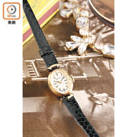 1968年女裝18K黃金橢圓形腕錶，配備真皮錶帶和切面錶鏡。