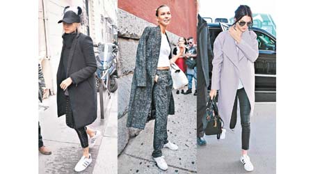 （左起）名模Gigi Hadid、Karlie Kloss和Kendall Jenner均示範以波鞋搭配長褸，令帶點嚴肅感覺的長褸穿出休閒時尚態度。