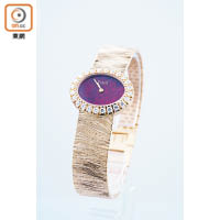 Piaget Extremely Lady紅寶石錶盤腕錶，配以18K玫瑰金木紋狀飾紋工藝錶帶。 $51.5萬（F）