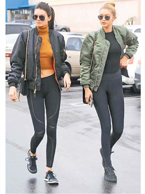 （左）Kendall Jenner及（右）Gigi Hadid呢對時裝界「孖妹」亦愛穿MA-1作「姊妹裝」打扮。