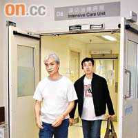 立法會議員梁耀忠（左）與周偉雄親到醫院探望傷者。