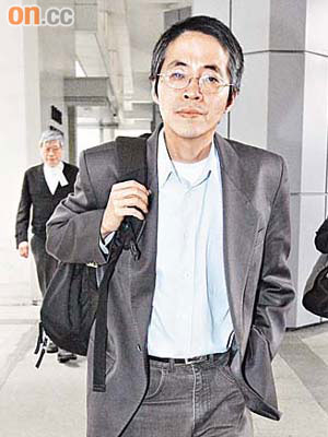 《明報》副執行總編輯劉進圖昨到庭聽審。	（陳錦輝攝）