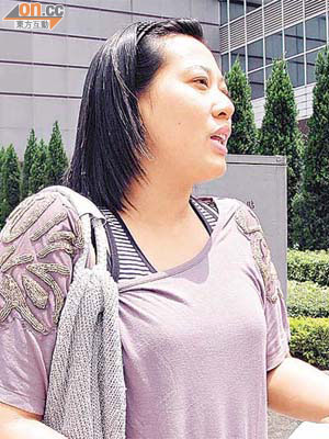 女事主陳煥雅昨出庭講述購買及飲了過期鮮奶的經過。（林伊蘭攝）