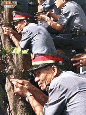 網上流傳一張疑似菲警手持「手指槍」的圖片。