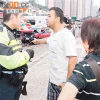 運魚車南亞裔司機向警員講述意外經過。