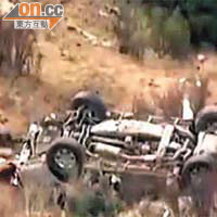 曾敏傑駕駛的越野車失控滾落山坡。	（電視畫面）