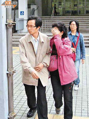 被告王潤財（左）昨被重囚四年半和停牌四年。	（資料圖片）