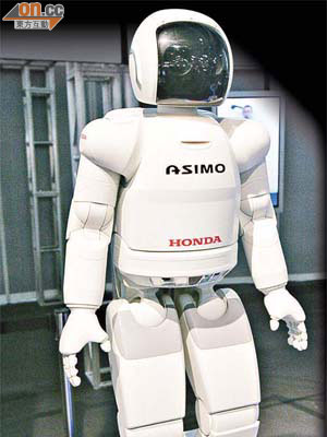 機械人ASIMO擁有與真人無異的動作和情緒反應。	（羅錦鴻攝）