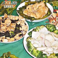 地球之友在餐宴中收集到的剩餘食物中，包括原隻元貝、鮑片等高價食材。
