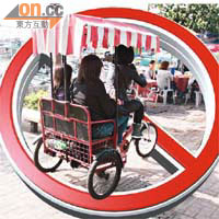 根據法例，三輪單車不可載人。
