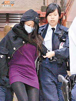 涉嫌斬傷前夫的女子被捕。	（文健雄攝）