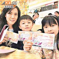 冼太與子女祝願日本災民可在晴朗的一天再出發。