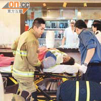 消防員要借用茶餐廳，第一時間將重傷的女工救出。