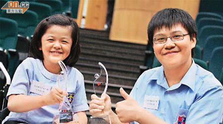 遇上困難永不放棄，卓詠（左）及立賢均表現出香港精神。	（蘇文傑攝）