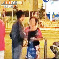 記者直擊<br>陳先生（中）抵達西灣河後致電旅館接待熱線，一名中年婦人（右）相約旅客到快餐店門外會合。