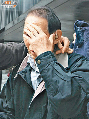 男被告廖曙光涉嫌以鐵錘襲擊妻子。