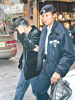 男乘客涉嫌與的士司機打架被捕。（蘇仲賢攝）